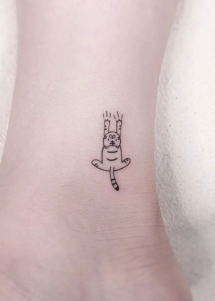 tatuajes gatos arañando